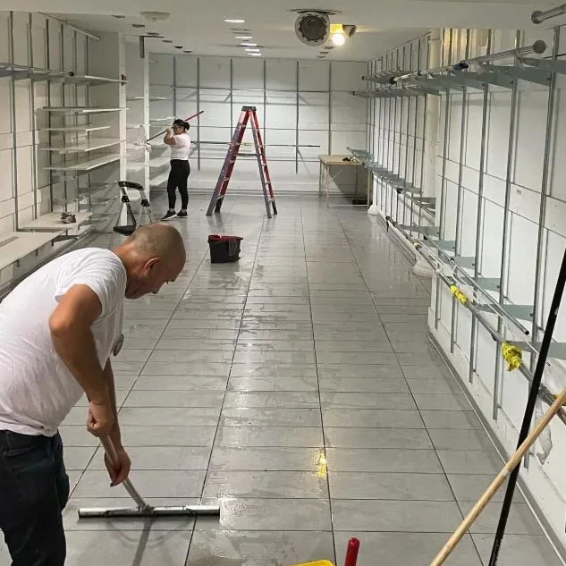Crew cleaning a newly finished store