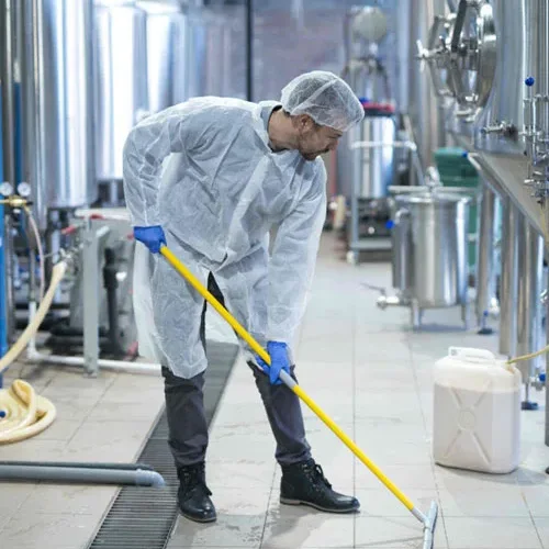 Mopping a restaurant kitchen floor